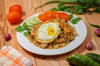 nasi goreng is made from rice shrimp meatballs with spicy spices processed by frying